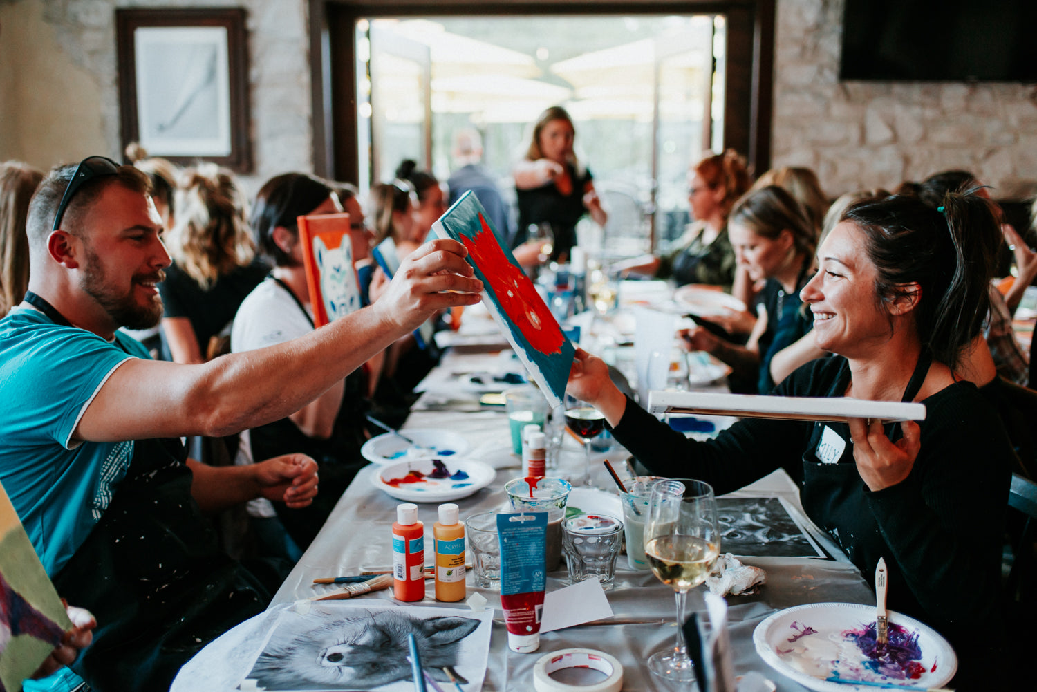 Group paints during a Paint Night hosted by Whistler artist Andrea Mueller