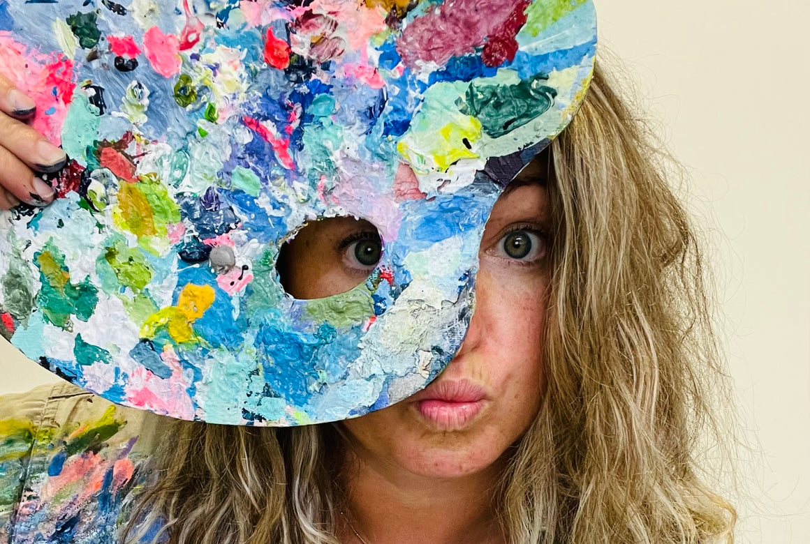 Whistler artist Andrea Mueller holding paint palette