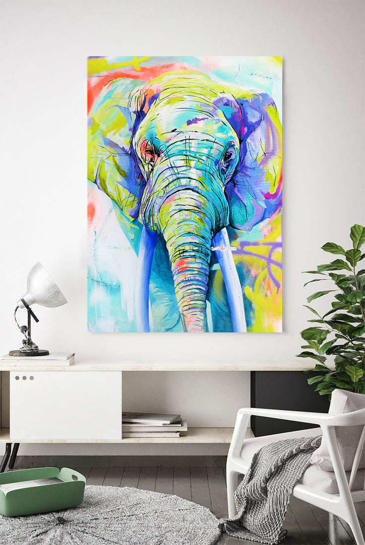 Trophy painting of colourful elephant on a wall.